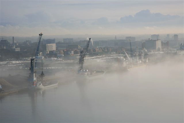 Aerial view of Southampton Docks on a foggy day.